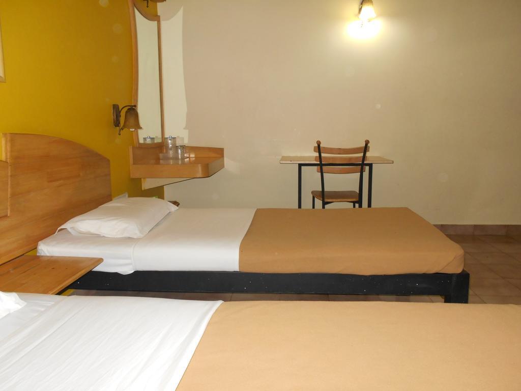 Tom'S Hotel Bangalore Cameră foto