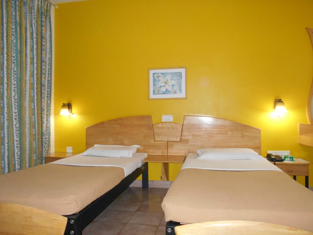 Tom'S Hotel Bangalore Cameră foto